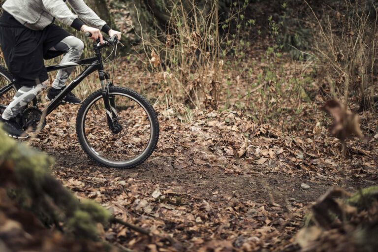 cyclist-riding-his-mountain-bike-on-forest-trail